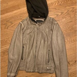 Signature studio, pho, leather jacket
With a hood